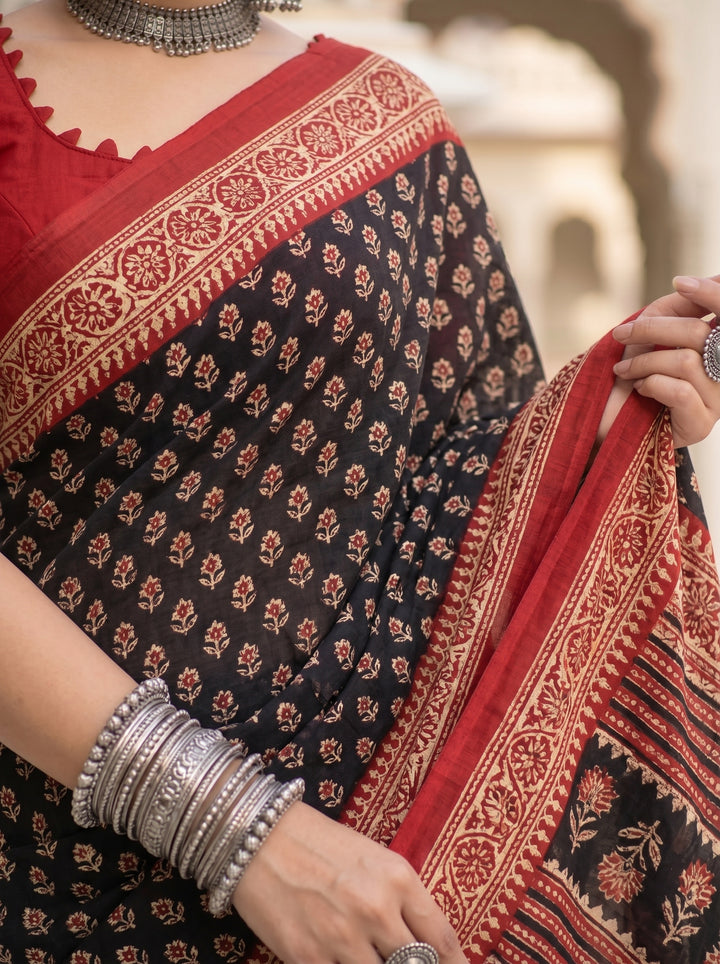PREMIUM SOFT ART SILK SAREE WITH TRADITIONAL ALL-OVER BOOTI PRINT & CONTRAST WOVEN BORDER - BLACK & RED