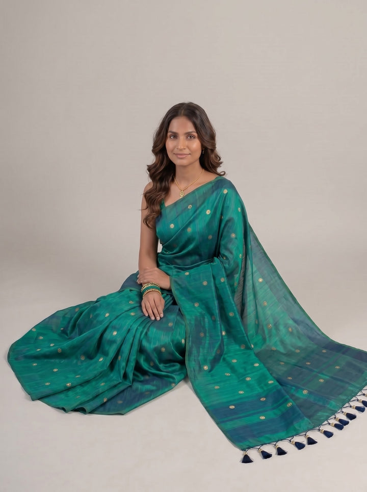 RAMA GREEN SOFT SILK BLEND SAREE WITH MIRROR WORK BUTTI & STYLISH TASSELS | CHANDERI SILK PARTY WEAR SAREE WITH UNSTITCHED BLOUSE PIECE