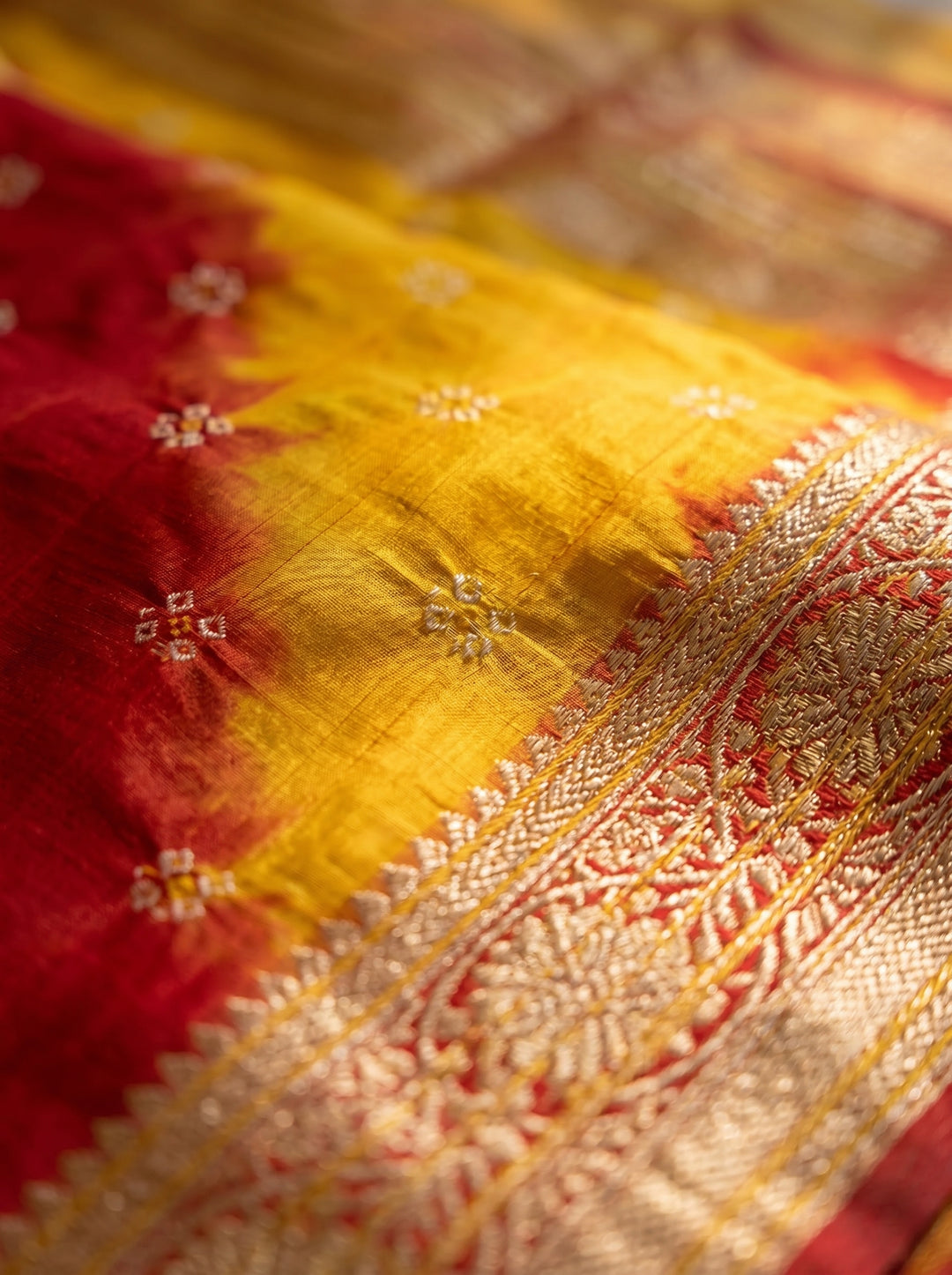 PREMIUM LIGHTWEIGHT GEORGETTE LEHERIYA SAREE WITH GOLDEN BUTTI & ZARI WOVEN BORDER - YELLOW & RED
