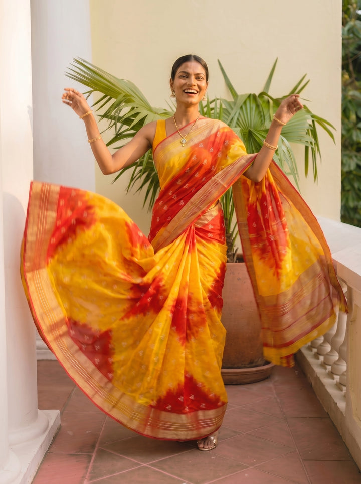 PREMIUM LIGHTWEIGHT GEORGETTE LEHERIYA SAREE WITH GOLDEN BUTTI & ZARI WOVEN BORDER - YELLOW & RED