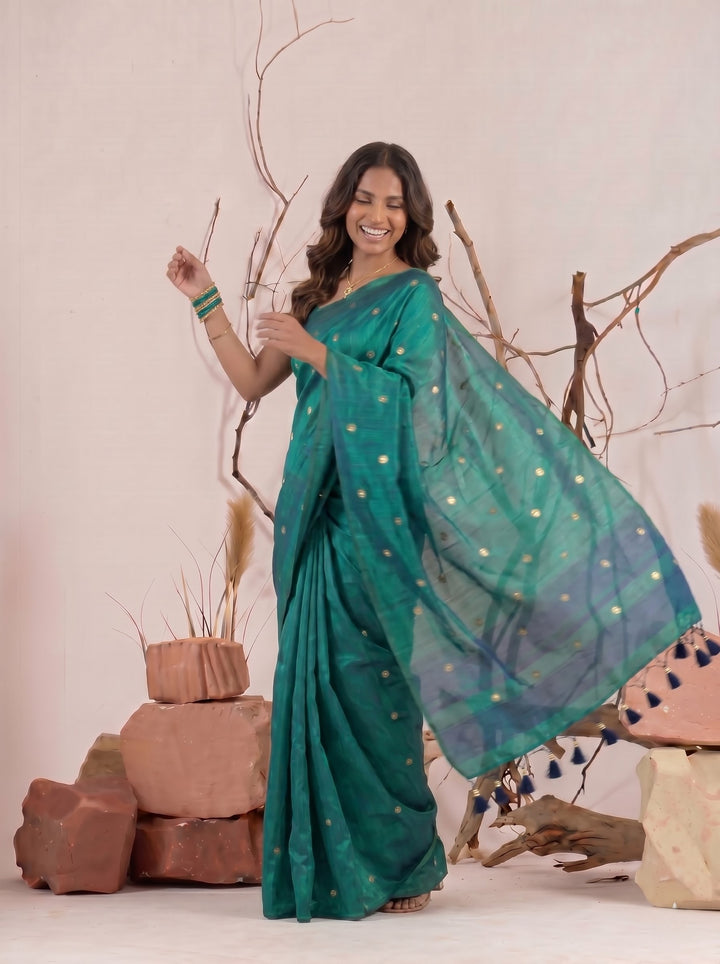 RAMA GREEN SOFT SILK BLEND SAREE WITH MIRROR WORK BUTTI & STYLISH TASSELS | CHANDERI SILK PARTY WEAR SAREE WITH UNSTITCHED BLOUSE PIECE