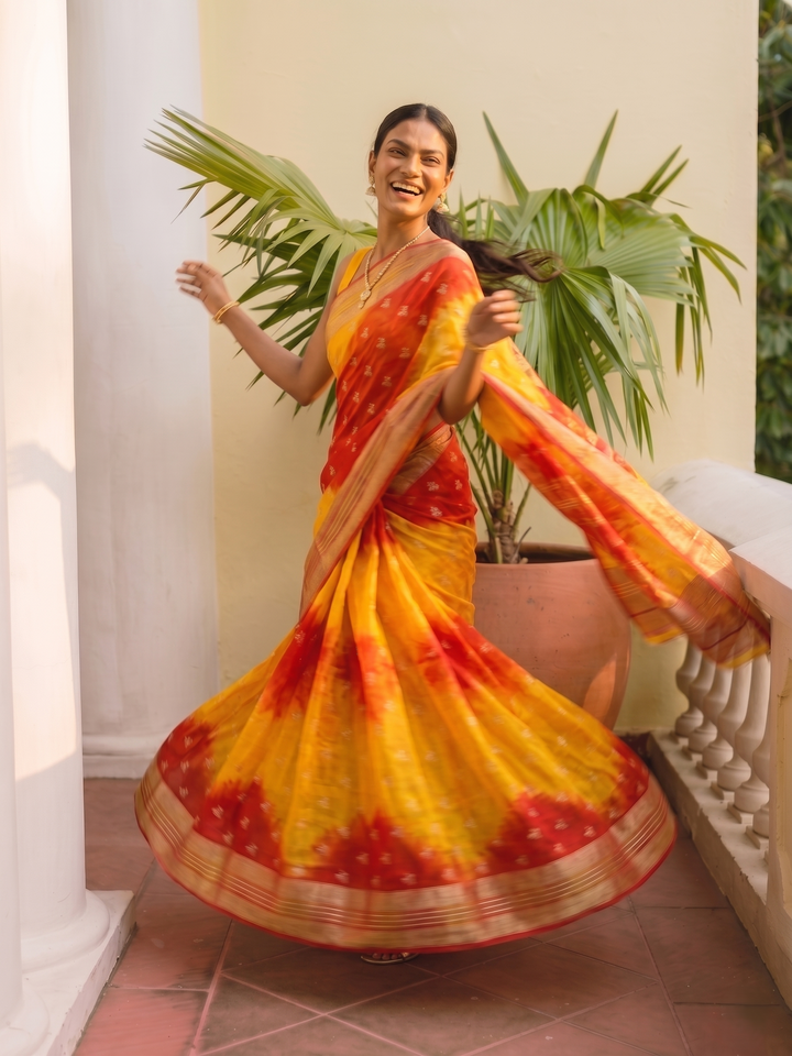 PREMIUM LIGHTWEIGHT GEORGETTE LEHERIYA SAREE WITH GOLDEN BUTTI & ZARI WOVEN BORDER - YELLOW & RED
