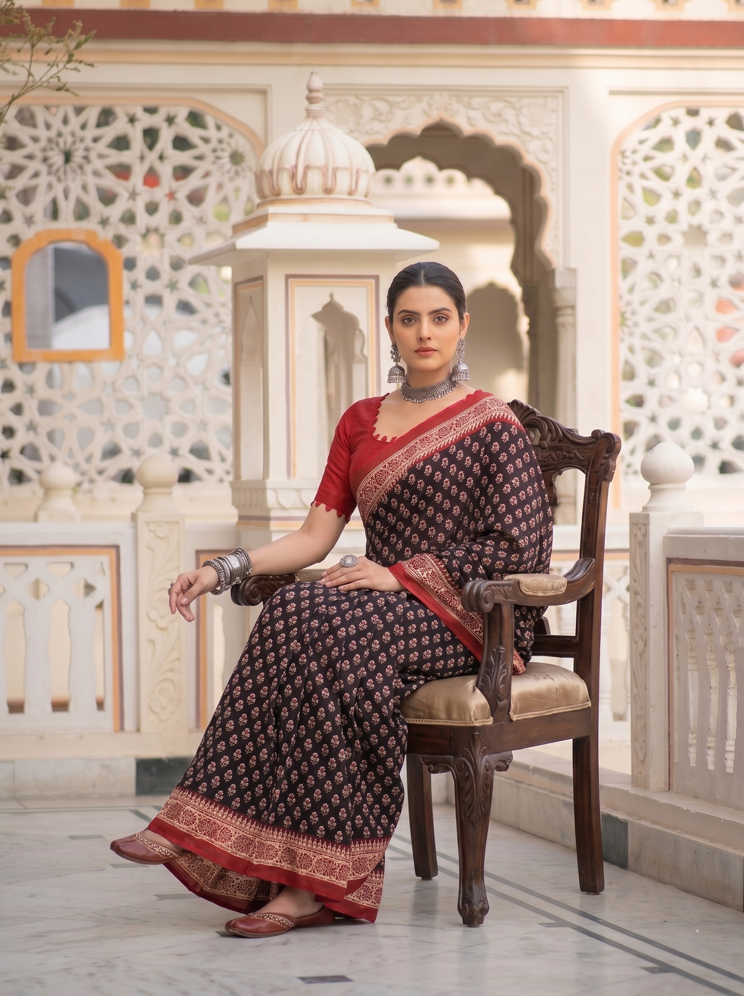 PREMIUM SOFT ART SILK SAREE WITH TRADITIONAL ALL-OVER BOOTI PRINT & CONTRAST WOVEN BORDER - BLACK & RED