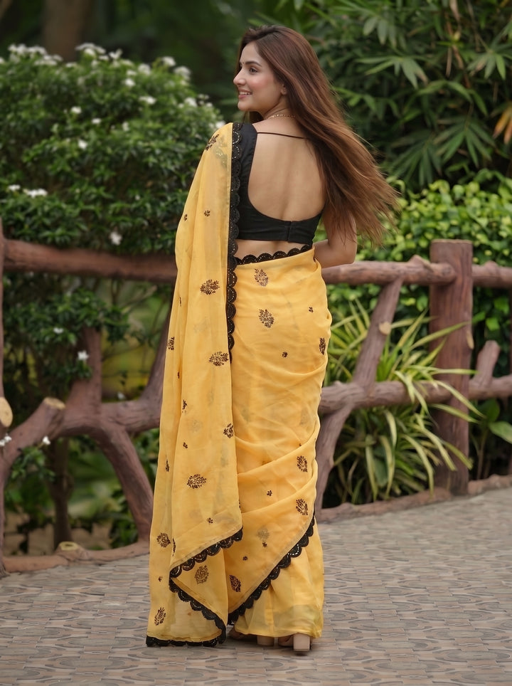 HALDI SPECIAL YELLOW DESIGNER SAREE WITH BLACK THREADWORK LACE