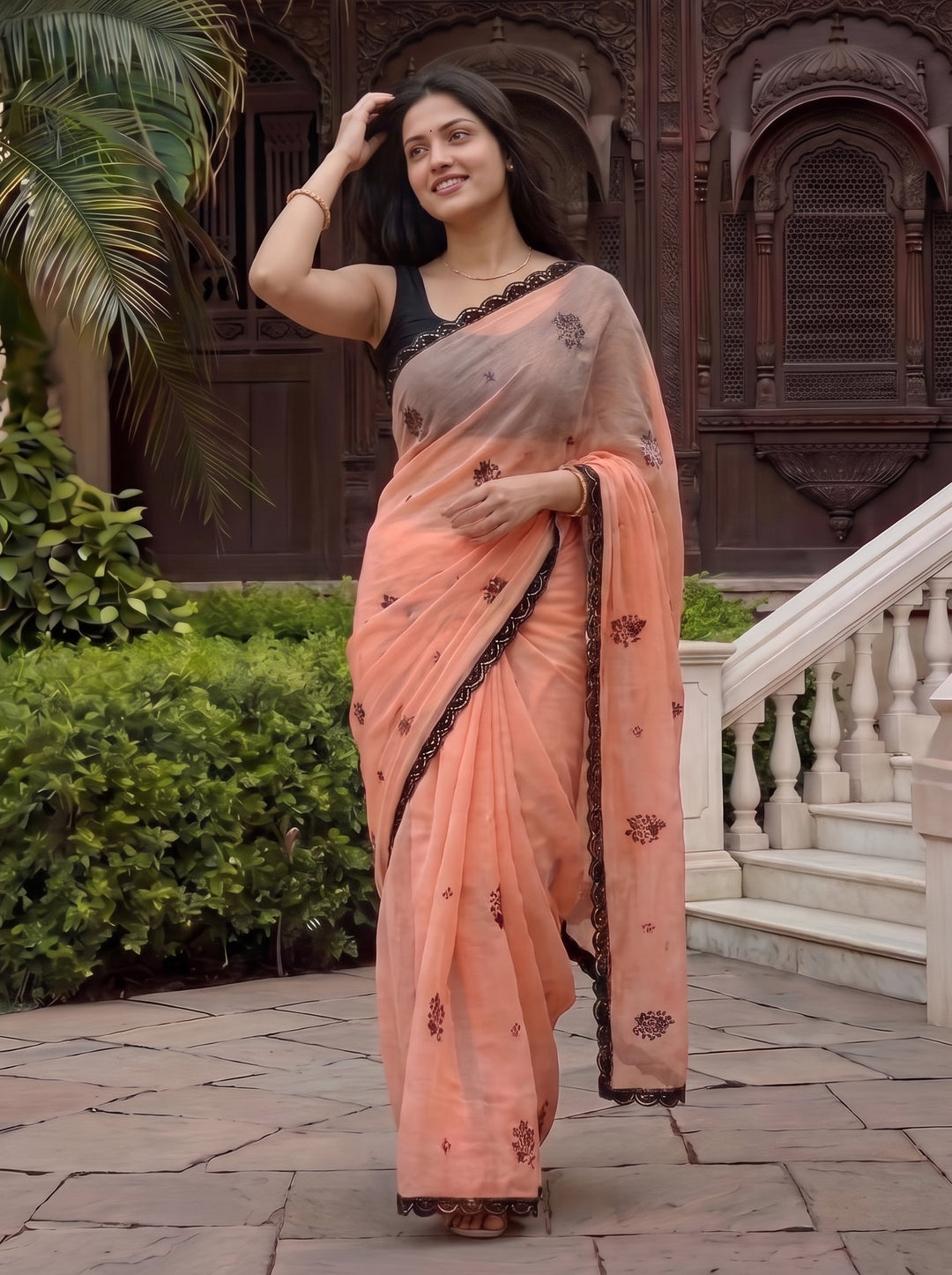 PEACH GEORGETTE SAREE WITH BLACK SCALLOPED BORDER