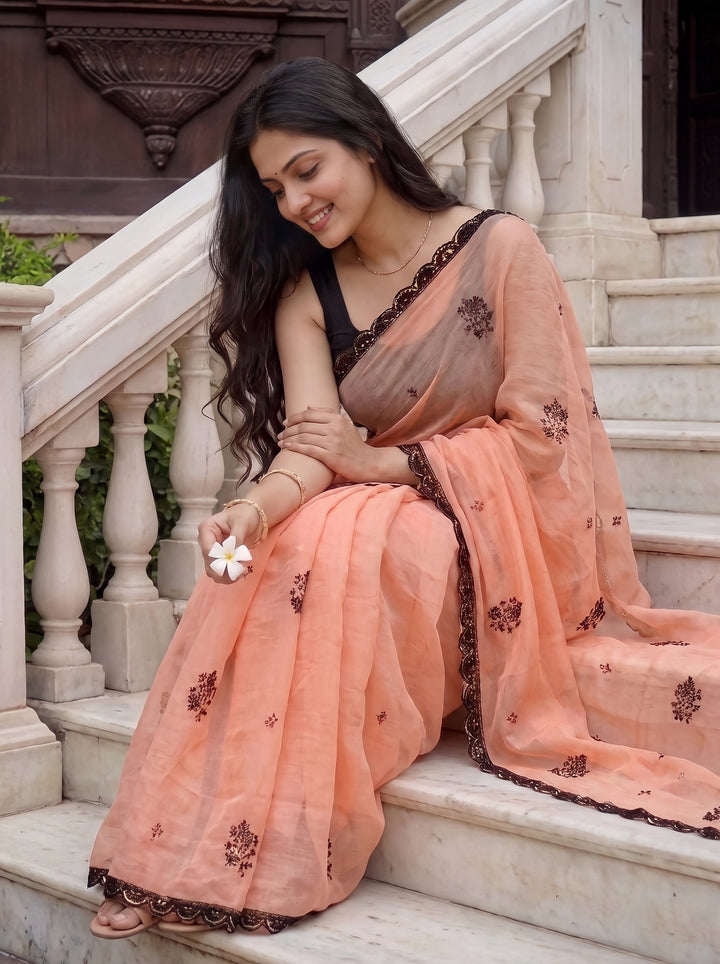 PEACH GEORGETTE SAREE WITH BLACK SCALLOPED BORDER