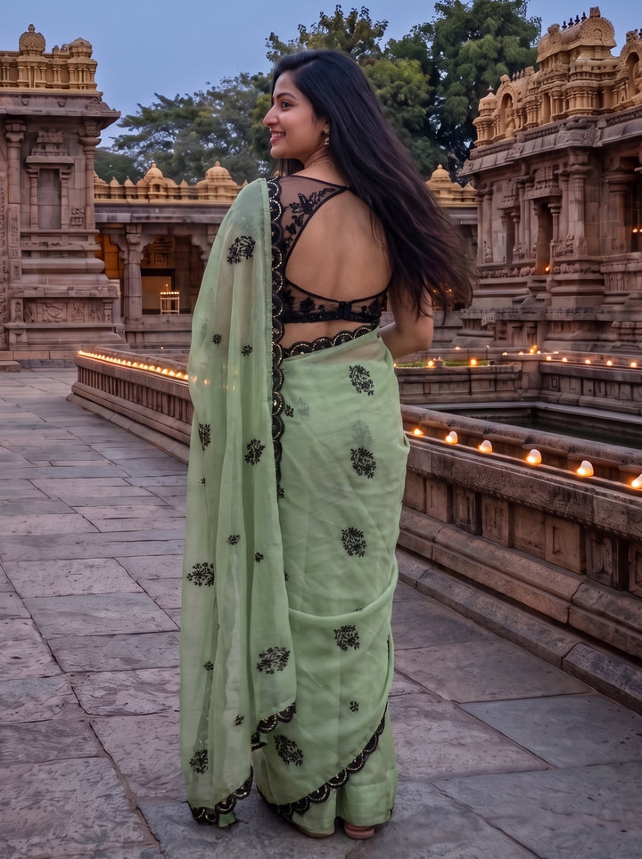 PASTEL GREEN DESIGNER SAREE WITH BLACK THREADWORK LACE