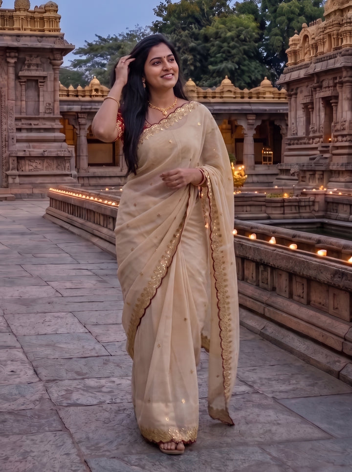 TRADITIONAL IVORY DESIGNER SAREE WITH GOLD THREADWORK
